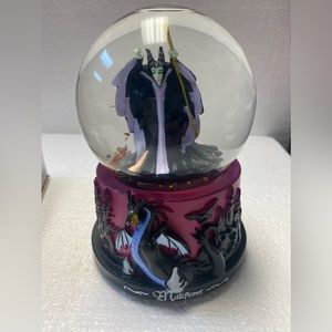 Maleficent musical, snow motion, globe. circa 2017